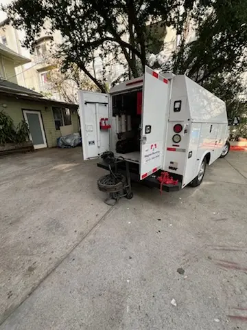 Magnet Plumbing service vehicle on-site for Grease Trap Cleaning in Floral City